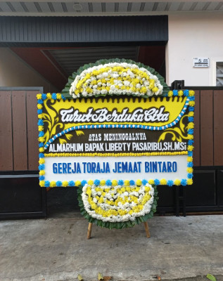 Papan Bunga Duka di Wek Vi