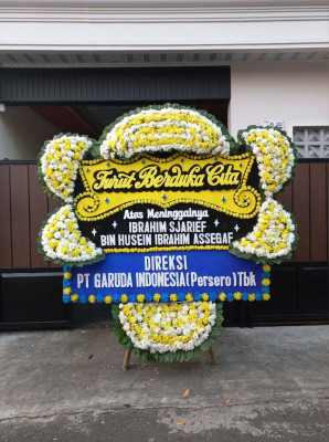 Papan Bunga Duka di Wek Vi